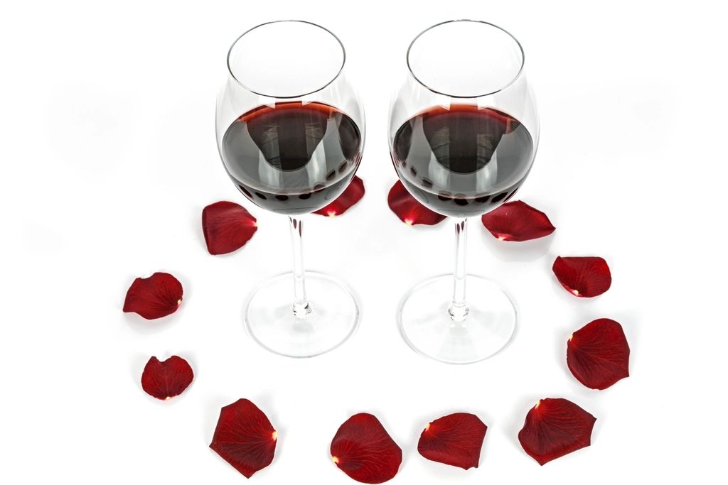 Wine glasses and bottles on the counter